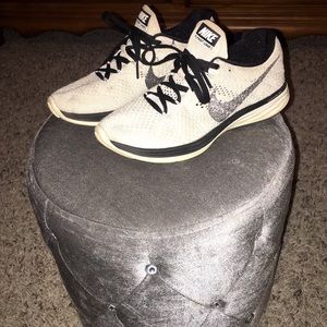 White Nike running shoes